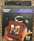 NIB ~ SHARPER IMAGE with USB Cable! 2.0 DIGITAL PHOTO KEYCHAIN ~ Rare Cherry Red