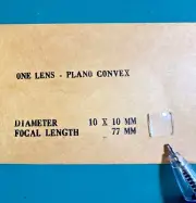 Edmund One Lens Plano Convex 10mm x 10mm Diameter 77mm Focal Length *Chipped*