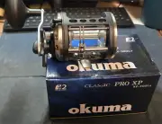 OKUMA CLASSIC PRO XP LEVELWIND STAR DRAG TROLLING REEL NEW IN BOX #0117346