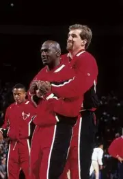 Chicago Bulls Michael Jordan during hug by Bill Wennington before - Old Photo