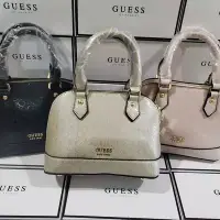 在飛比找Yahoo!奇摩拍賣優惠-【King女王代購】GUESS 新款歐美純色簡約壓紋大容量字