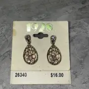 Vintage brand new drop-down dangle gold tone pink stone earrings company 1928