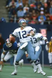 Quarterback Roger Staubach of Dallas Cowboys drops back to pass v - Old Photo 3
