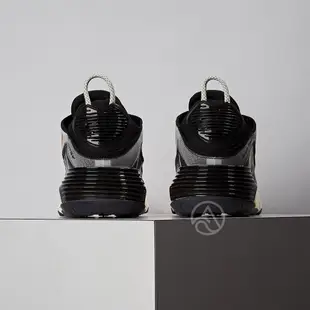 Nike Air Max 2090 男鞋 黑橘 炫彩 潑墨 氣墊 慢跑 休閒鞋 DD8497-160