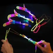 10 Pcs Amazing Led Light Arrow Rocket Rotating Flying Toys Kids Outdoor Flashing Toy Fly Arrow