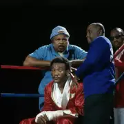 George Foreman with cornermen assistant trainer Archie Moore - 1973 Old Photo