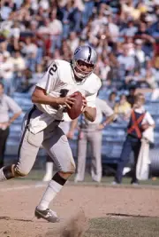 Quarterback Ken Stabler Oakland Raiders drops back to pass at a m- 1974 Photo 1