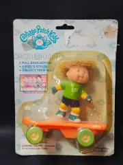 VINTAGE 1997 CABBAGE PATCH KIDS PULL BACK SKATEBOARD TOY SEALED NIB Green Shirt