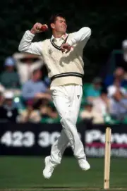 Graeme Hick bowling for Worcestershire during the Benson and - Old Cricket Photo