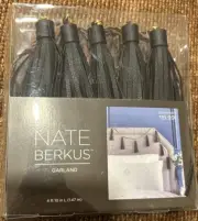 Nate Berkus Faux Leather Black Tassel Garland Brown Braided Stringg