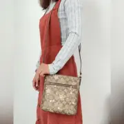 NWT Coach Mini Rowan File Bag In Signature Canvas With Star And Snowflake Print