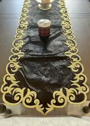 Table Runner: 85 x 20 inches approx. Black background with Gold Silk Embroidery