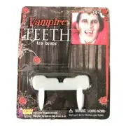 vampire teeth Plastic. Not To Be Used Over Braces. Brand New