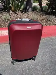 Ricardo Beverly Hills spinner 22"H Maroon Red hard shell carry-on suitcase