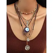 Women's Boho Layered Charm Necklace Set – Multilayer Evil Eye, Sun Star Pendants with Beaded Choker, for Spiritual Fashion, Festivals and Everyday Wear