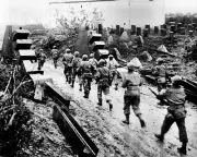 New 8x10 World War II Photo: American Troops Marching thru the Siegfried Line