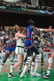 Larry Bird Boston Celtics vies for rebound position v Manute Bol W- Old Photo