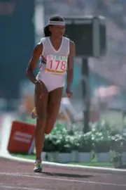 English track athlete Gladys Taylor competes for Great Britain to - Old Photo