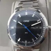 ORIS TT1 Day Date Black Dial Steel Watch. Watch pics taken with original plastic