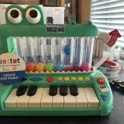 Battat Croco Pop PianoToyKeyboard with Songs Sounds Lights,Baby and Toddler Toys