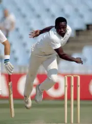 Gladstone Small bowling for Warwickshire against Yorkshire d- Old Cricket Photo