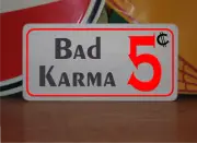 Bad Karma 5 cents Metal Sign