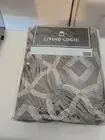 Living Logic 84-in charcoal Light Filtering Grommet Single Curtain Panel 953946