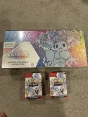 Pokemon Prismatic Evolutions Super Premium Collection and 2 Booster Bundles