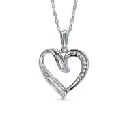 0.07 CT. T.W. Baguette and Round Natural Diamond Heart Pendant in Sterling Silver