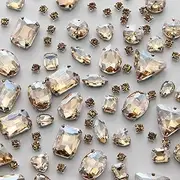 TANOSII Sew on Rhinestones 100 PCS Mixed Shapes Glass Rhinestones Sew on Crystal Gems Mental Flatback with Silver Claw for Jewelry Crafts Clothes Shoes Costume Garment Champagne