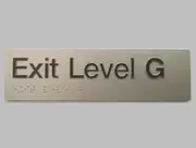 AS1428 Compliant Exit Sign Level G SILVER Ground Level Braille 180x50x3mm