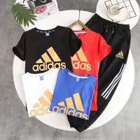 在飛比找Yahoo!奇摩拍賣優惠-現貨熱銷-Adidas愛迪達童裝男女中大T恤夏季款金色冰山印