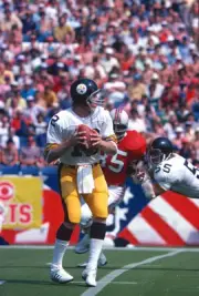 Quarterback Terry Bradshaw Pittsburgh Steelers drops back to pass- 1974 Photo 1