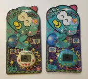 Dinkie Dino Electronic Virtual Pet RakuRaku Dinokun White and Green Set of 2 NEW