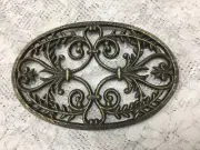 Fleur De Lis Oval Trivet, Cast Iron Gold Over Black,