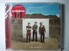 The Album TARGET Exclusive CD 2 Bonus Songs by Jonas Brothers