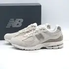 Size 9 Men's New Balance 2002R Sneakers M2002RJN Light Dark Tan