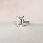 5.78ct moisaanite emerald with round cut wedding ring