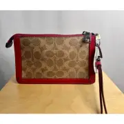 Coach Wristlet in Signature Canvas. New with Tags. Red and Tan.