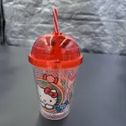 Hello Kitty Tumbler With Straw And Lollipops In A Plastic To Go Cup