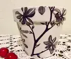 Hand decorated black and white terracotta flower pot with dragonflies and birds