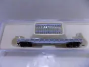 FLAT CAR WITH STAKES FOR: UNDECORATED BY ATLAS NOS