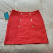 NWT Lizzie Driver Golf Skort Sz. 4 NEW orange sherbert