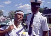 Zina Garrison USA with a security guard after a match during the W- Old Photo