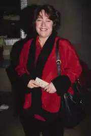 Kathy Bates wearing a red jacket with black trim at 51st Golde- 1991 Old Photo