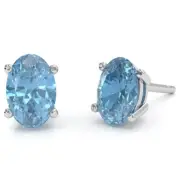 Blue Topaz 8x6mm Oval Stud Earrings In 14k White Gold