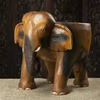 在飛比找ETMall東森購物網優惠-泰國創意實木雕個性大象凳可愛型兒童凳換鞋凳原木板凳木墩子擺件