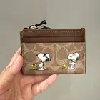 Coach X Peanuts Mini Skinny Id Case In Signature Canvas With Snoopy Print CBT14