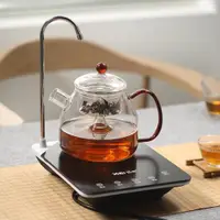 在飛比找ETMall東森購物網優惠-煮茶壺自動上水電陶爐煮茶小型電磁爐迷你鐵壺燒水泡茶帶抽水茶爐