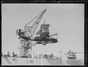 Plane being hoisted onto the H.M.A.S Albatross NSW 16 January 1930 1 Old Photo